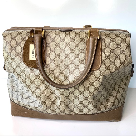 Gucci Handbags - Gucci large carry on vintage leather / canvas bag